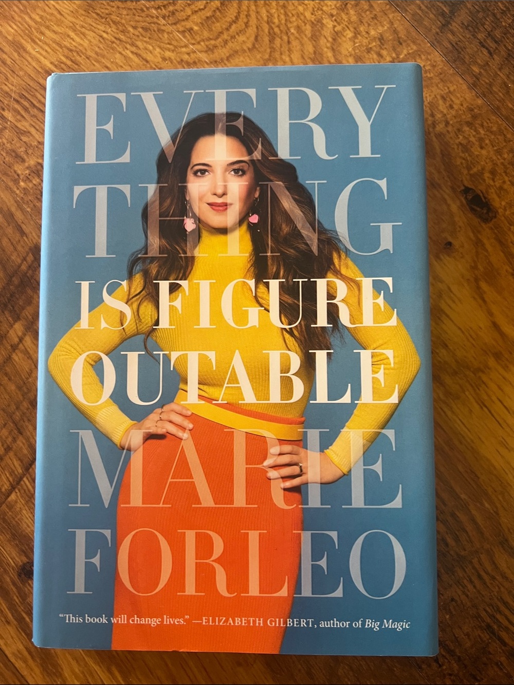 Everything Is Figureoutable by Marie Forleo - Blue Cover, Yellow & Orange Design
